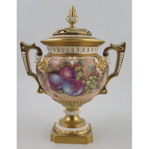 487 - A Royal Worcester two handled covered vase, painted half round with fruit by Telford, raised on a sq... 