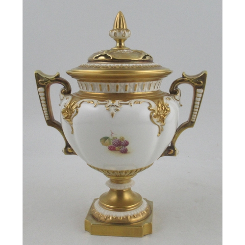 487 - A Royal Worcester two handled covered vase, painted half round with fruit by Telford, raised on a sq... 