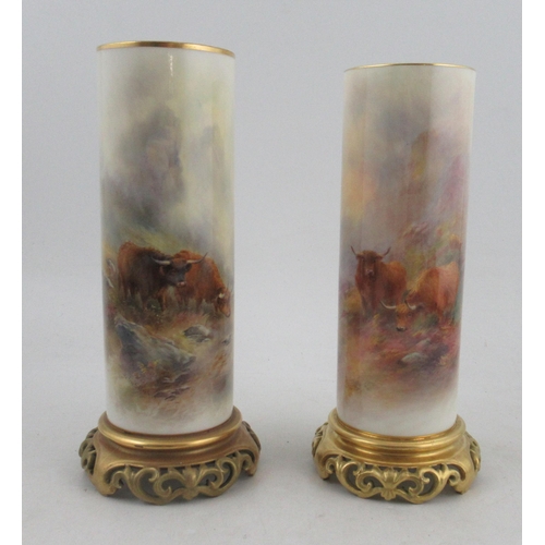 500 - A pair of Royal Worcester spill vase, finely painted with Highland cattle by John Stinton, raised on... 