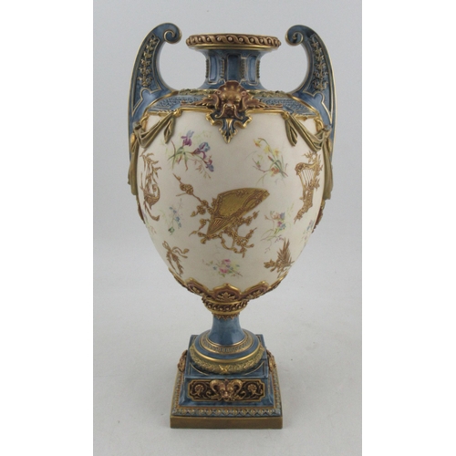 507 - A Royal Worcester Hadleys style pedestal vase, decorated with coloured flowers, gilded fans, harps a... 