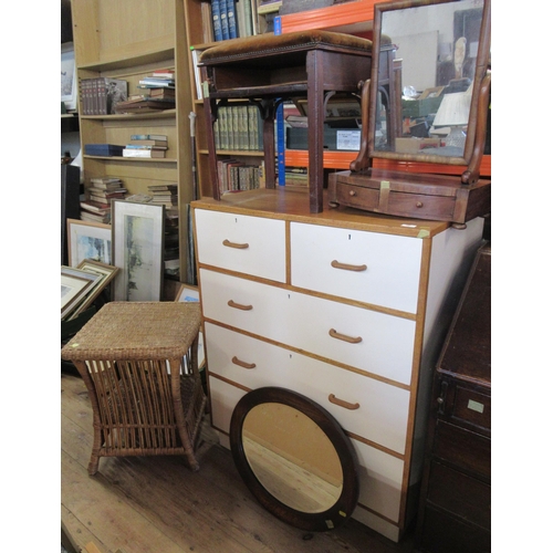 58 - A chest of drawers, together with a swing frame toilet mirror, a wicker table, a dressing table mirr... 