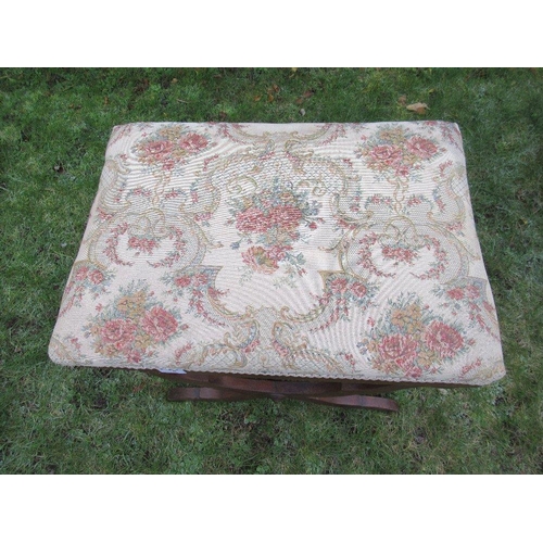 6 - An upholstered stool raised on x frame stretchers 23ins x 16ins, height 20ins