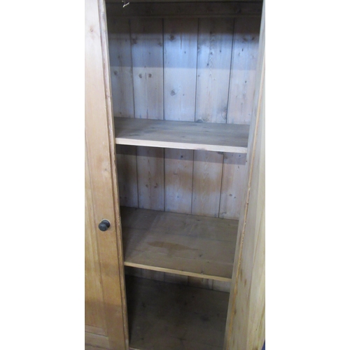 64 - A pine wardrobe, width 44ins, height 68ins