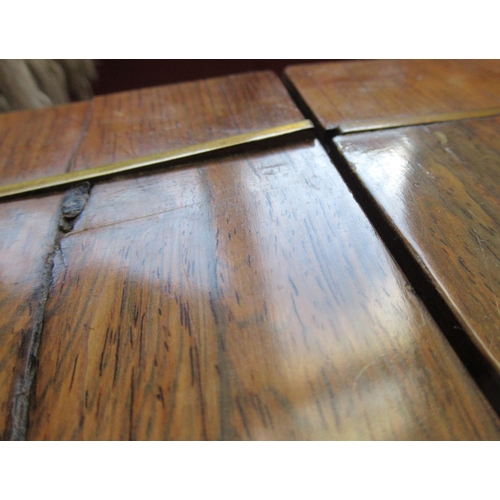 8 - A Regency rosewood sofa table, with brass stringing, fitted with two frieze drawers, with central br... 