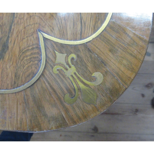 8 - A Regency rosewood sofa table, with brass stringing, fitted with two frieze drawers, with central br... 