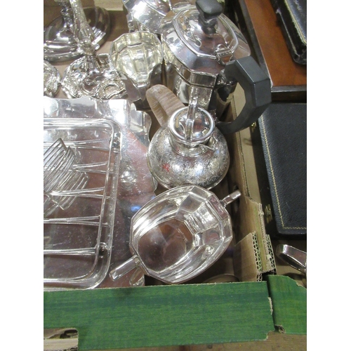 221A - Three boxes of assorted silver plate to include four branch candelabra , tea set , jersey jug, flatw... 