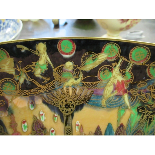 359 - A Wedgwood Fairyland lustre pedestal bowl, decorated with figures, buildings, fairies, trees, foliag... 