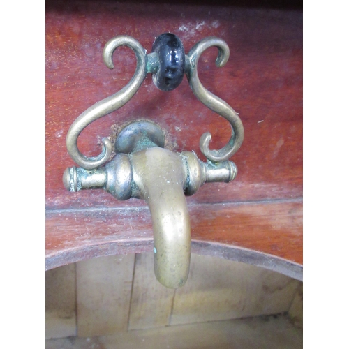 12 - A Victorian mahogany wash stand/desk, with sloping hinged lid, fitted with a cupboard