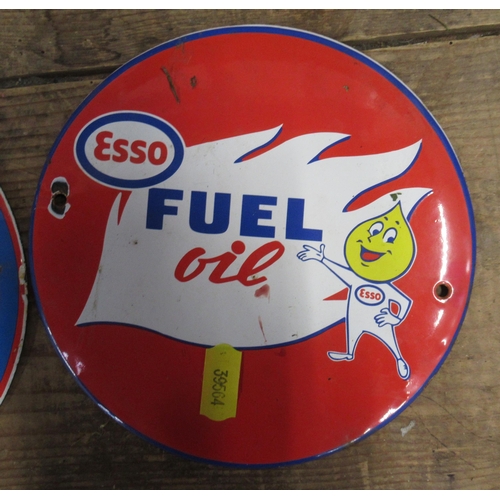 135 - Two circular enamel plaques, Esso Fuel Oil and Gulf Gasoline