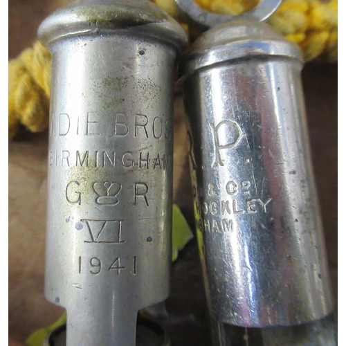 166 - Two Hudson & Co Birmingham ARP whistles, together with an Aide Bros. Birmingham whistle