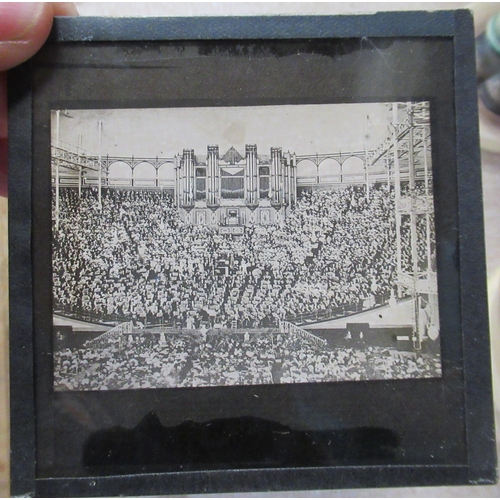 177 - Four pine boxes, containing glass slides with black and white images, to include portraits, building... 