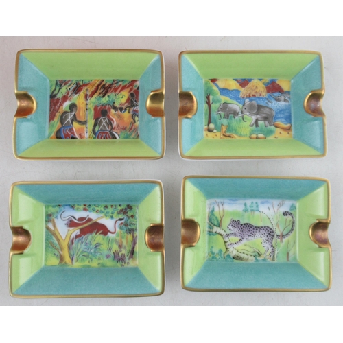 191 - A boxed set of four Hermes porcelain ashtrays, printed with racehorses, together with another boxed ... 