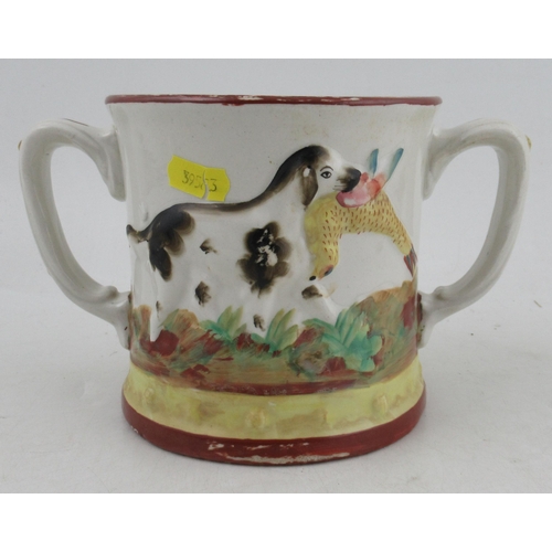 208 - A Staffordshire frog loving mug, embossed with two hounds, one carrying a pheasant, with frog to the... 