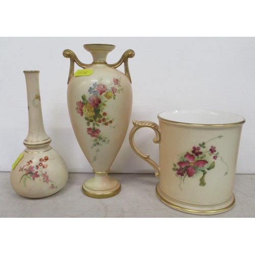 250 - A Royal Worcester blush ivory tankard, decorated with floral sprays, together with two Royal Worcest... 