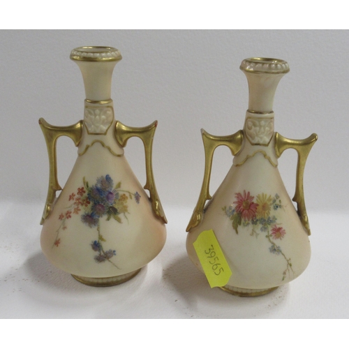 259 - A pair of Royal Worcester blush ivory vases, decorated with floral sprays, shape number 1021, one un... 