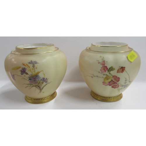 260 - A pair of Royal Worcester blush ivory covered vases, decorated with floral sprays, with inner covers... 