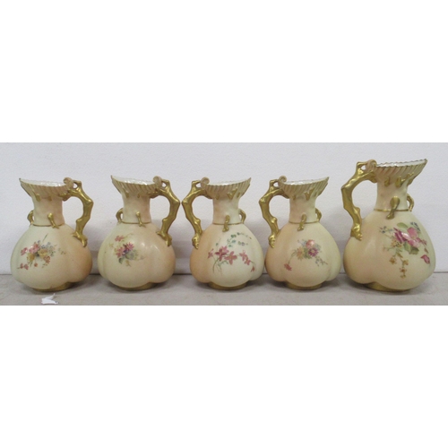 265 - Five Royal Worcester blush ivory coral jugs, all decorated with floral sprays, shape number 1507, he... 