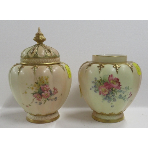 267 - Two Royal Worcester blush ivory vases, one with restored cover, decorated with floral sprays, shape ... 