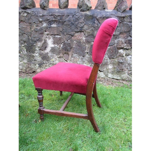 28 - A set of four dining chairs, with red upholstery