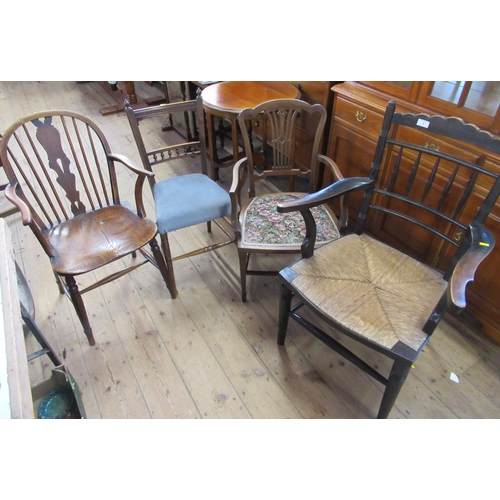 3 - A Windsor chair, together with three other chairs