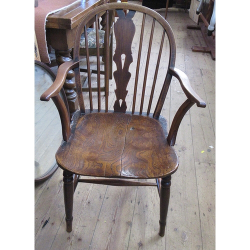 3 - A Windsor chair, together with three other chairs