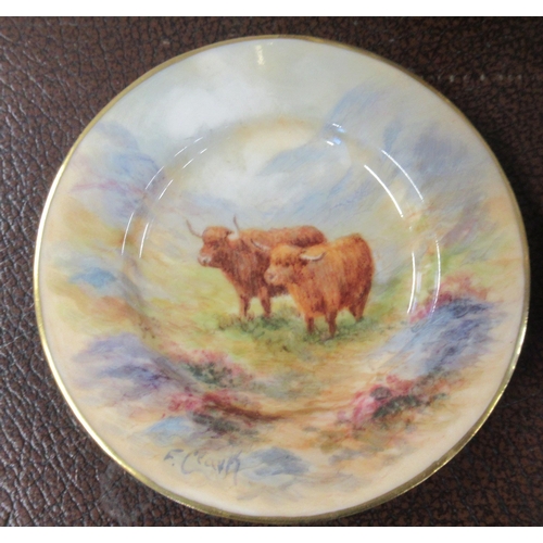 306 - A miniature coffee set, decorated with Highland cattle in landscape by F Clark