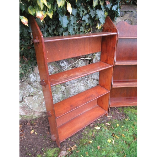 31 - An Arts and Crafts style set of shelves and a mahogany set