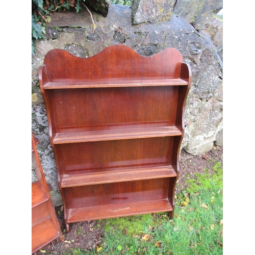 31 - An Arts and Crafts style set of shelves and a mahogany set