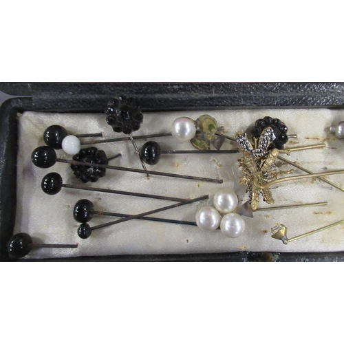 334 - A collection of hat pins, together with a corkscrew and a wooden snuff box