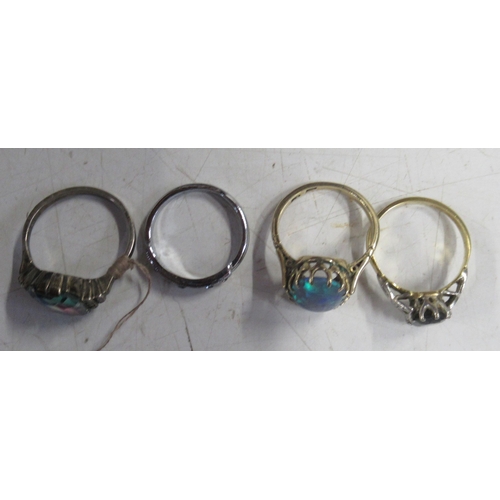 357 - Four stone set rings