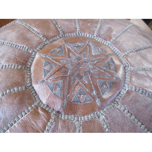 40 - A leather pouffe