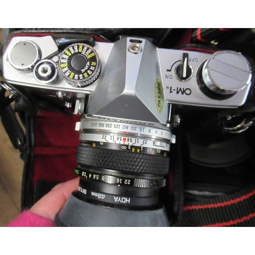 404 - An Olympus Camera and equipment