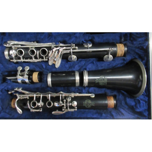 405 - Four cased clarinets