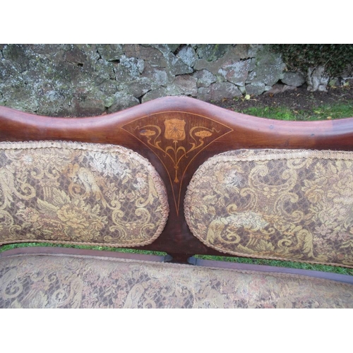 42 - An Edwardian salon settee, with inlaid decoration