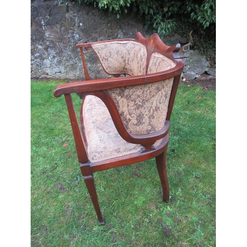 42 - An Edwardian salon settee, with inlaid decoration