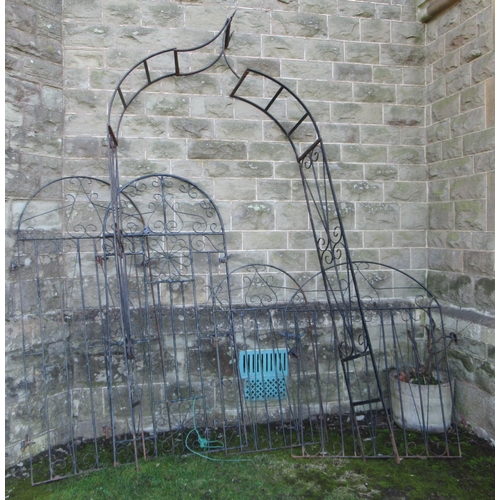 43 - Four metal garden gates and a metal arbor