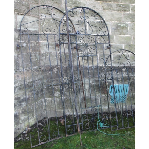 43 - Four metal garden gates and a metal arbor