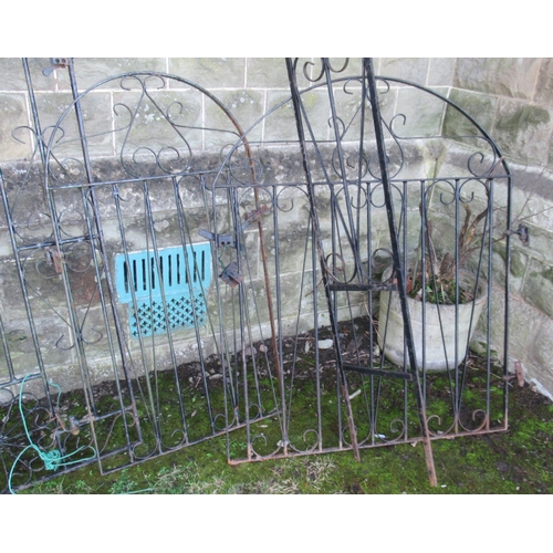 43 - Four metal garden gates and a metal arbor