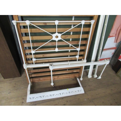 45 - An Edwardian white painted bedstead, together with a fire surround and screen