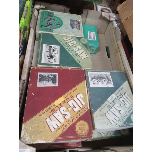 487 - Two boxes of vintage jigsaws, including Chad Valley