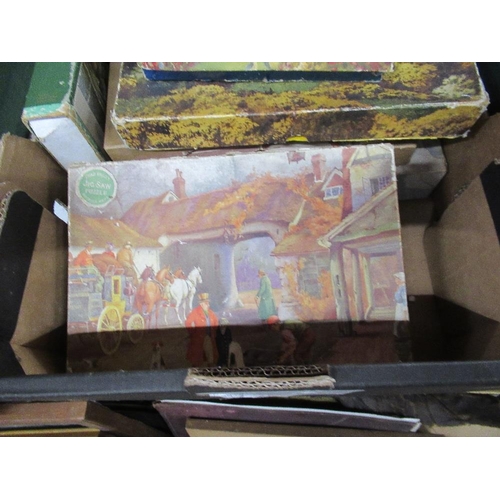 488 - Two boxes of vintage jigsaws