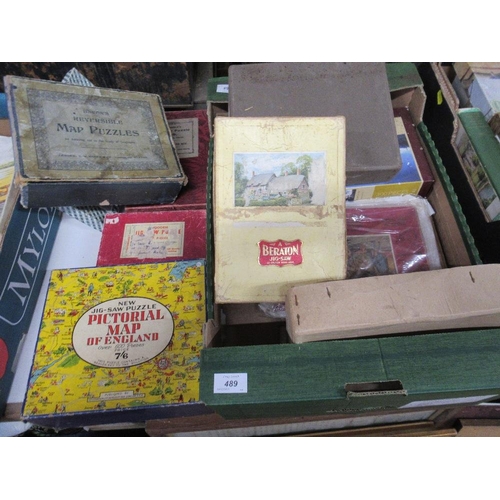 489 - A box of vintage jigsaws