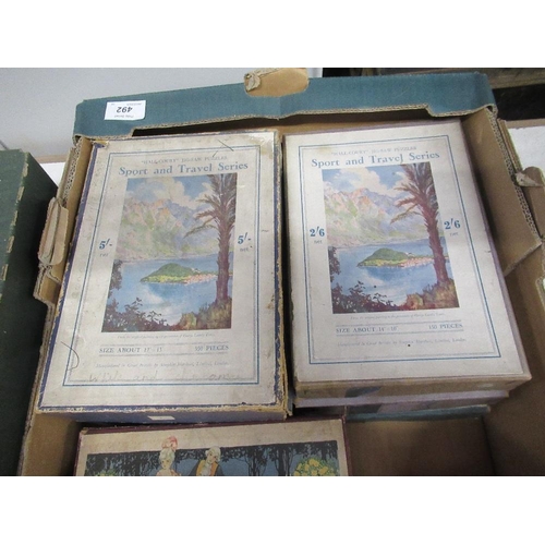 492 - Two boxes of vintage jigsaw puzzles