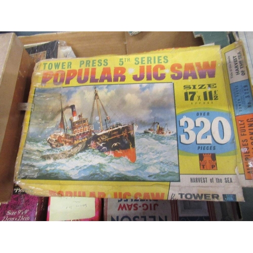 492 - Two boxes of vintage jigsaw puzzles