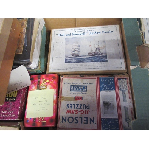 492 - Two boxes of vintage jigsaw puzzles