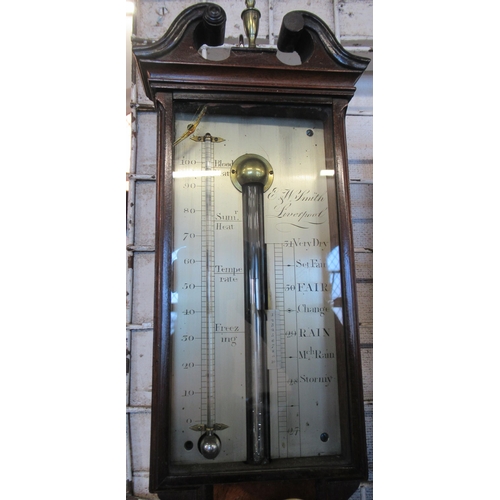 69 - E & W Smith, Liverpool, a 19th century mahogany stick barometer with mercury filled tubes