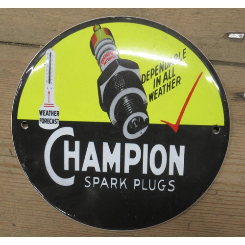 160 - Two circular enamelled signs, Champion Spark Plugs and Red Crown Gasoline, diameter 6ins and 12ins