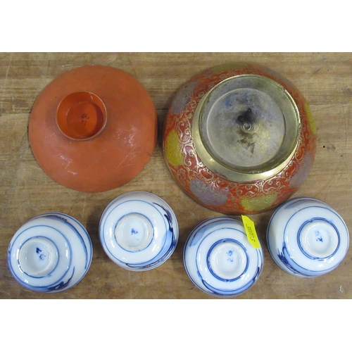 194 - A group of Oriental design bowls, one metal, one papier mache and the others porcelain