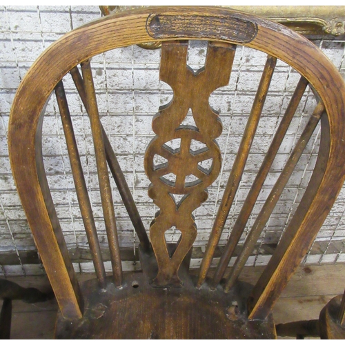 2 - A pair of Windsor open armchairs, with elm seats and pierced wheel back splat, together with four si... 