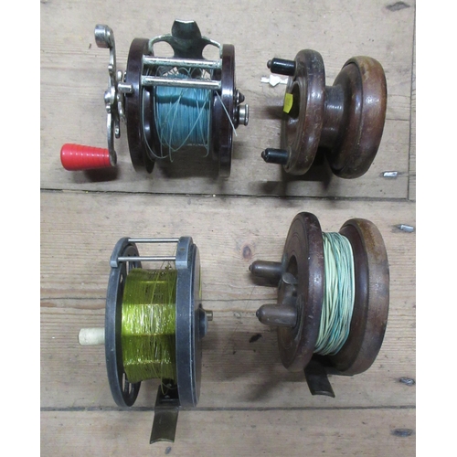 217 - The Allcock Aerial fishing reel, together with a Penn No.85 fishing reel and two wooden fishing reel... 